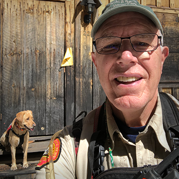 Wayne Behrens and "Scout", certified air scent and large source cadaver