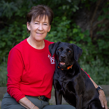 Karen Atkinson and "Quincy", certified human remains detection